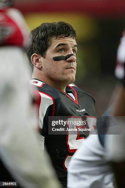 Linebacker Keith Brooking of the Atlanta Falcons stands on the sidelines during the game against the Jacksonville Jaguars at the Georgia Dome on...