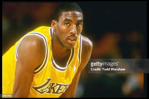 Guard Eddie Jones of the Los Angeles Lakers takes a break during game against the Golden State Warriors at the Great Western Forum in Inglewood,...