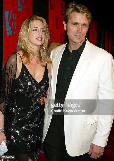 Hollywood, CA Actor John Schneider and wife Elli arrive to The WB Networks 2004 All-Star Winter Party on January 13, 2004 at the Hollywood and...
