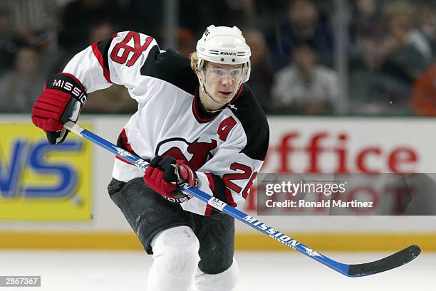 Left wing Patrik Elias of the New Jersey Devils skates on the ice during the game against the Dallas Stars at the American Airlines Center on...