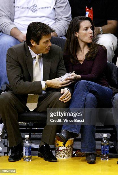 Actress Kirstin Davis and guest attend the game between the Los Angeles Lakers and the Denver Nuggets on January 14, 2004 at the Staples Center in...