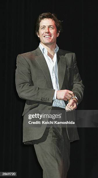 Actor Hugh Grant attends the Tokyo premiere of "Love Actually" on January 15, 2004 in Tokyo, Japan.