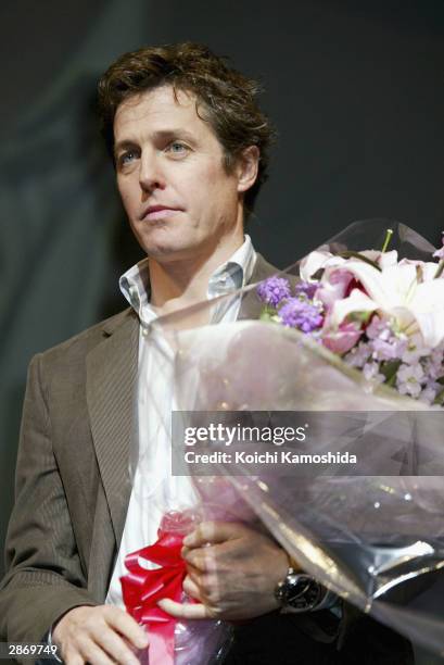 Actor Hugh Grant attends the Tokyo premiere of "Love Actually" on January 15, 2004 in Tokyo, Japan.