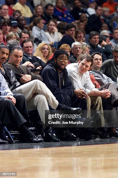 Mike McKenzie of the Green Bay Packers and sports agent Brian Parker enjoy a game between the Memphis Grizzlies and Chicago Bulls at the Pyramid...