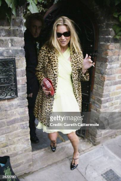 Kate Moss leaves her West London home on her 30th birthday today January 16, 2004 in London. It has been rumoured that she would be celebrating her...