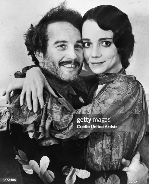 American actors Richard Dreyfuss and Jessica Harper embrace in a promotional still from the film, 'Inserts,' directed by John Byrum, 1975.