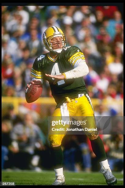 Quarterbak Brett Favre of the Green Bay Packers looks to pass the ball during a game against the Chicago Bears at Lambeau Field in Green Bay,...