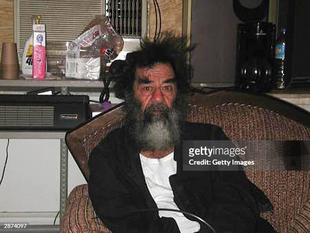 This unsourced picture alleges to show Iraqi leader Saddam Hussein in an unknown location in Iraq after his capture by US troops on December 13, 2003...