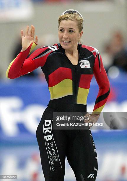 Anni Friesinger of Germany waves to cheering fans during the women's 1,000m world sprint championships at Nagano Olympic memorial arena M-Wave, 17...