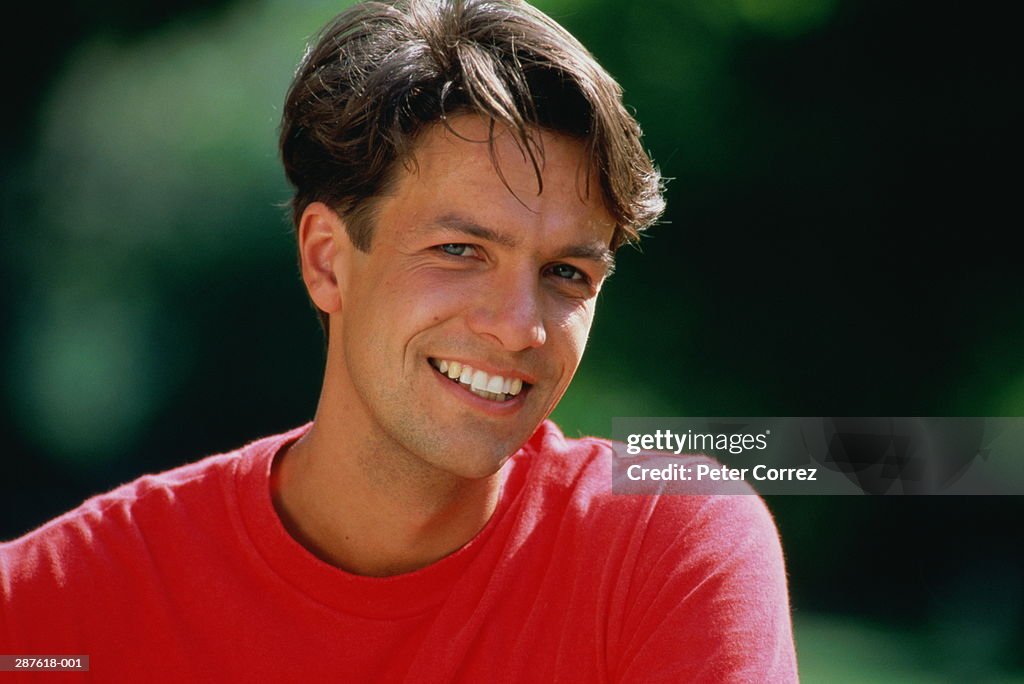 Portrait of man in red T-shirt