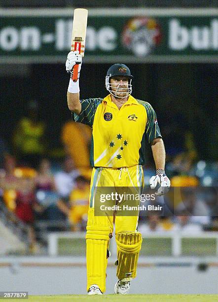 Matthew Hayden of Australia reaches his century during the VB Series One Day International between Australia and India at the 'Gabba on January 18,...