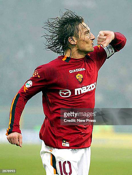 Francesco Totti of Roma celebrates after scoring a goal during the Serie A match between AS Roma and Sampdoria at the Stadio Olympico on January 18,...