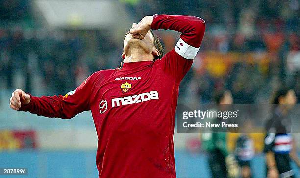 Francesco Totti of Roma celebrates after scoring a goal during the Serie A match between AS Roma and Sampdoria at the Stadio Olympico on January 18,...