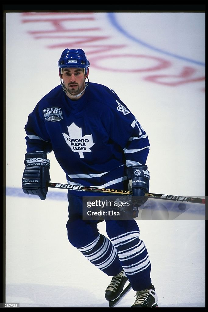 Toronto Maple Mathiue Defenseman Mathieu Schneider of the Toronto Maple Leafs moves down ...