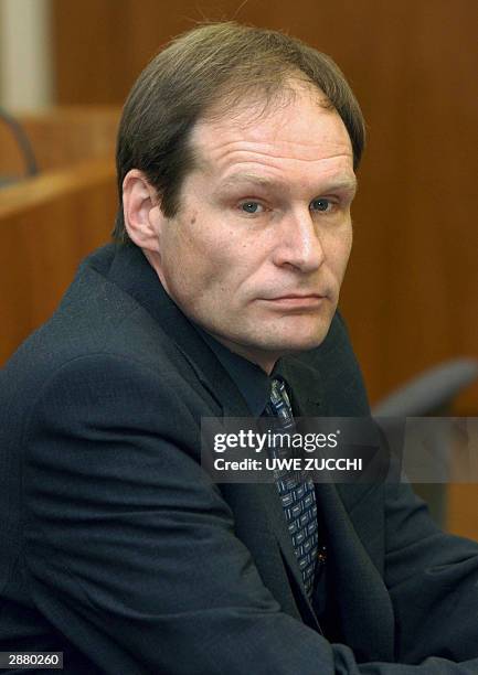 German self-confessed cannibal Armin Meiwes waits for the start of his trial for having killed and eaten a man, Bernd-Juergen Brandes, 19 January...