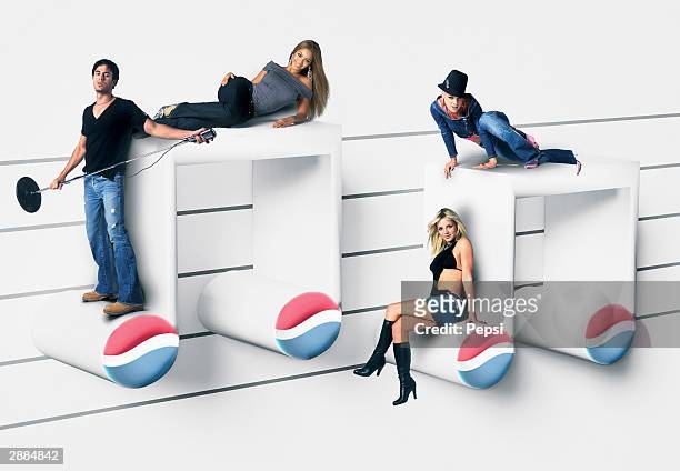 In this handout photo-montage provided by Pepsi , Pepsi returns this year with its most exciting line up ever for International Pepsi Music. The...