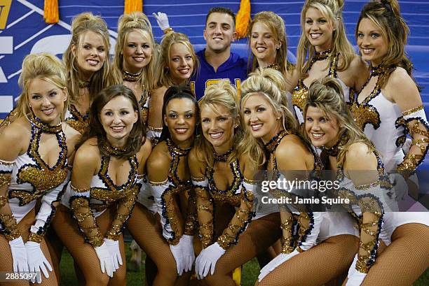 The Tiger Girls, the dance team at LSU, pose for a picutre during the SEC Championship Game against the Georgia Bulldogs on December 6, 2003 at the...