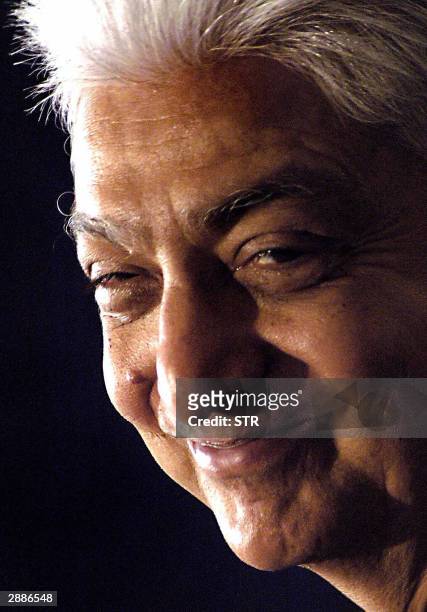 Indian software giant Wipro Ltd chairman Azim Premji, smiles during a press conference in Bangalore, 21 January 2004. Wipro Ltd said Wednesday...