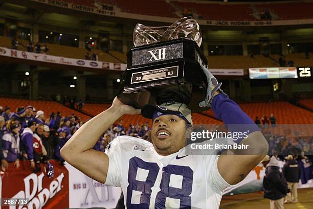 Tight end Thomas Hill of the Kansas State Wildcats celebrates after defeating the Oklahoma Sooners in the Dr. Pepper Big 12 Championship on December...