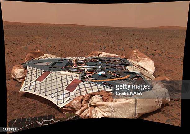 In this NASA handout, the panoramic camera onboard the Mars Exploration Rover Spirit shows the rover's landing site, the Columbia Memorial Station...