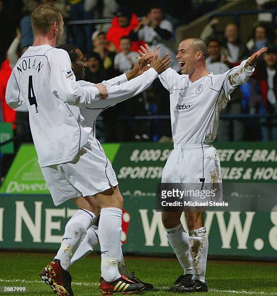 Stelios Giannakopoulos of Bolton celebrates with Kevin Nolan after scoring Bolton's third goal during the Carling Cup Semi-Final First Leg match...