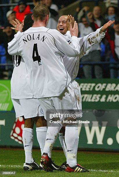 Stelios Giannakopoulos of Bolton celebrates with Kevin Nolan after scoring Bolton's third goal during the Carling Cup Semi-Final First Leg match...