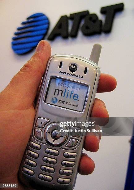 The AT&T Wireless logo is seen on a cellular telephone at an AT&T store January 21, 2004 in San Mateo, California. It has been reported through a...