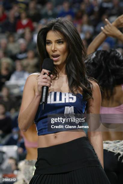 Actress Roselyn Sanchez sings during the game against the Golden State Warriors at American Airlines Center on January 7, 2004 in Dallas, Texas. The...