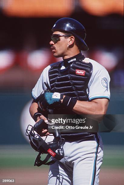FLORIDA MARLINS CATCHER BENITO SANTIAGO LOOKS OUT OVER THE FIELD DURING THEIR GAME AGAINST THE GIANTS AT CANDLESTICK PARK IN SAN FRANCISCO,...