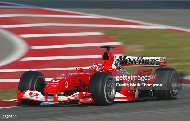 Michael Schumacher of Germany and Ferrari in action during Formula One testing at the Circuit de Catalunya on January 22, 2004 in Barcelona, Spain.