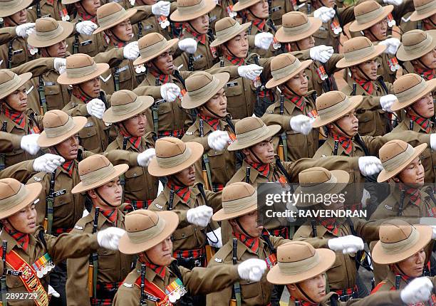 Soldiers from the Indian army's Assam Rifles regiment march during a full final dress rehearsal parade for India's forthcoming Republic Day...