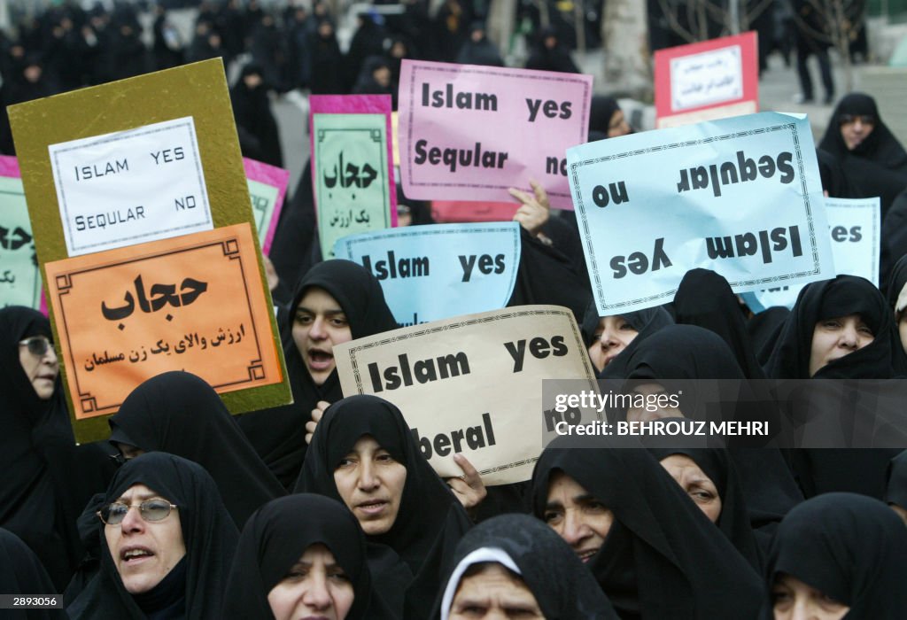 Some 150 Iranian conservative women shou