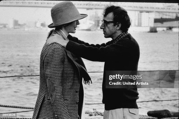 American actors Diane Keaton and Woody Allen in a scene from 'Annie Hall,' directed by Allen, New York, New York, 1977. Allen has his hands on...