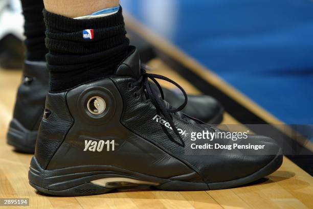Detail of shoes belonging to Yao Ming of the Houston Rockets during the game against the Washington Wizards at MCI Center on January 13, 2004 in...