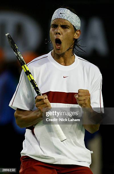 Rafael Nadal of Spain celebrates a point against Lleyton Hewitt of Australia during day six of the Australian Open Grand Slam at Melbourne Park...