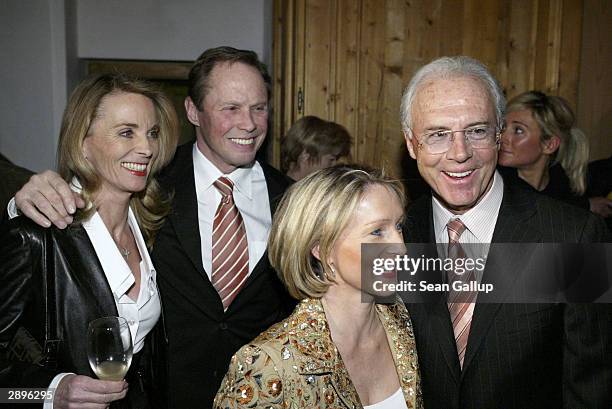 Singer Peter Kraus, his wife Ingrid, Heidrun Burmester and FC Bayern Muenchen president Franz Beckenbauer attend the Audi Evening at Hotel Tenne...