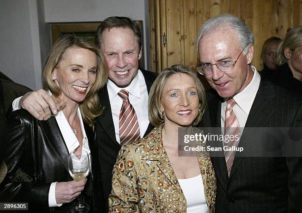 Singer Peter Kraus, his wife Ingrid, Heidrun Burmester and FC Bayern Muenchen president Franz Beckenbauer attend the Audi Evening at Hotel Tenne...