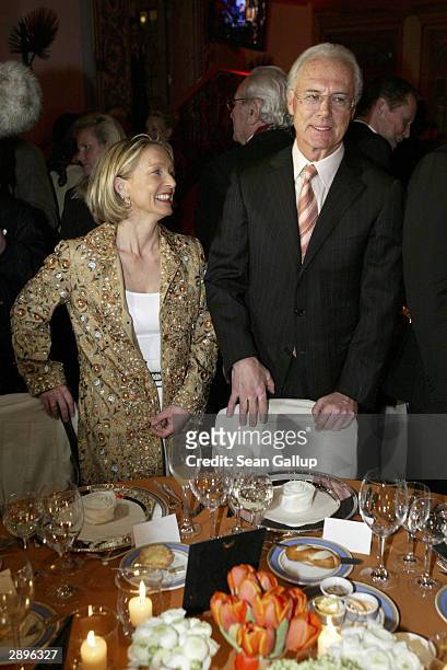 Bayern Muenchen president Franz Beckenbauer and Heidrun Burmester attend the Audi Evening at Hotel Tenne during the Hahnenkamm Ski Races January 23,...