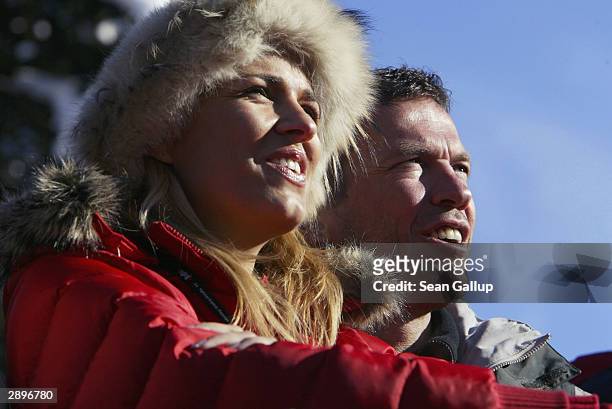 Former German football international Lothar Matthaeus and his wife Mariana watch the men's downhill at the Hahnenkamm Ski Races January 24, 2004 in...