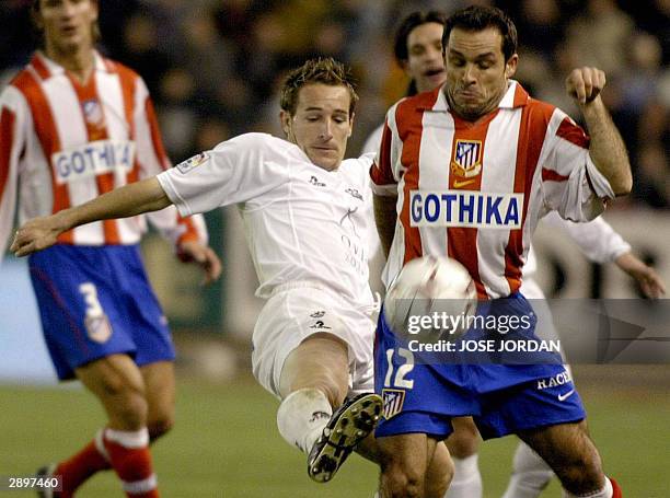 Albacete's Ivan Diaz vies with Atletico Madrid's Barjuan Sergi during a Premier league match in Carlos Belmonte stadium in Albacete 24 January 2003.