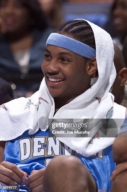 Carmelo Anthony of the Denver Nuggets takes a break during a game against the Memphis Grizzlies on January 25, 2004 at the Pyramid Arena in Memphis,...