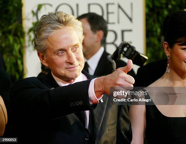Actor Michael Douglas and actress Catherine Zeta-Jones attend the 61st Annual Golden Globe Awards at the Beverly Hilton Hotel on January 25, 2004 in...