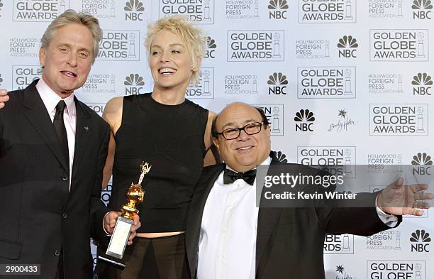 Winner of the Cecil B. DeMille Award Actor Michael Douglas, Actress Sharon Stone, and Actor/Director Danny DeVito pose backstage at the 61st Annual...