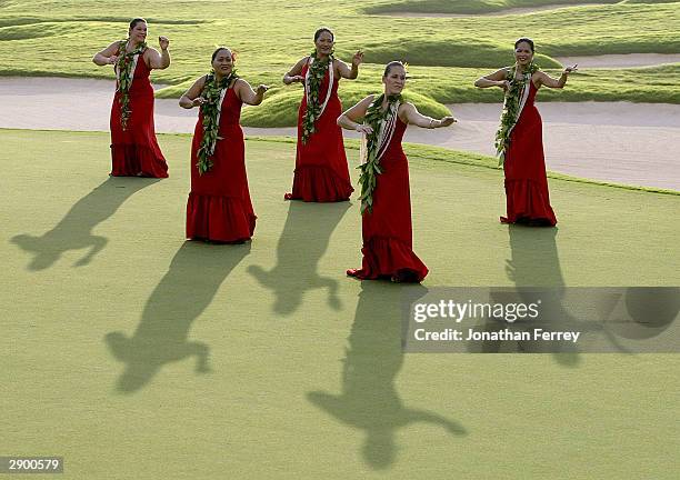 Hula dancers entertain the crowd after the Champions Tour Mastercard Championship on January 25, 2004 at the Hualalai Golf Club in Ka'upulehu, Hawaii.