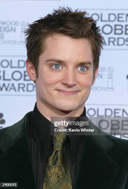 Actor Elijah Wood poses backstage at the 61st Annual Golden Globe Awards at the Beverly Hilton Hotel on January 25, 2004 in Beverly Hills, California.