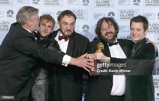 Winner for Best Director in a Motion Picture and Best Motion Picture for Drama the cast of "Lord of the Rings" pose backstage at the 61st Annual...