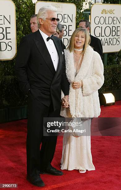 Actress Barbra Streisand and Husband James Brolin attend the 61st Annual Golden Globe Awards at the Beverly Hilton Hotel on January 25, 2004 in...