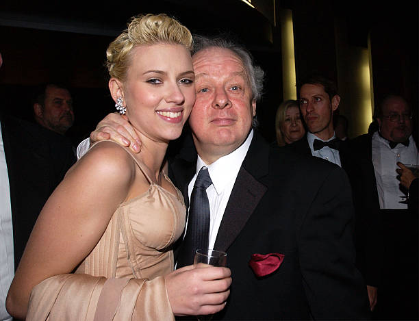 Actress Scarlett Johansson and director Jim Sheridan attend the Universal-Focus Features after-party during the 61st Annual Golden Globe Awards on...