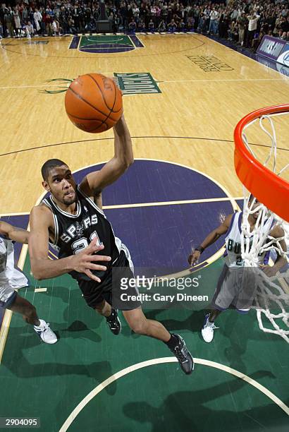 Tim Duncan of the San Antonio Spurs goes up for the potential game-winning dunk, later overturned because time had expired, against the Milwaukee...