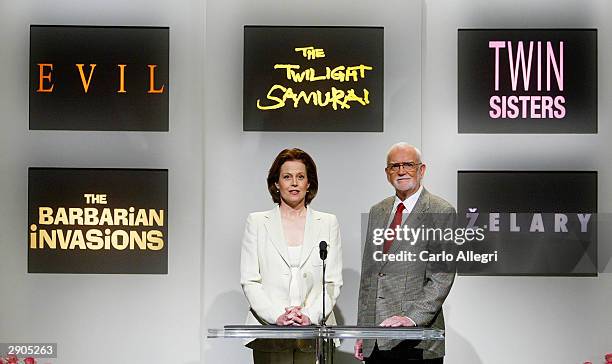 Actress Sigourney Weaver and Frank Pierson, President of the Acadamy of Motion Picture Arts and Sciences read the list of nominees for Best Foreign...